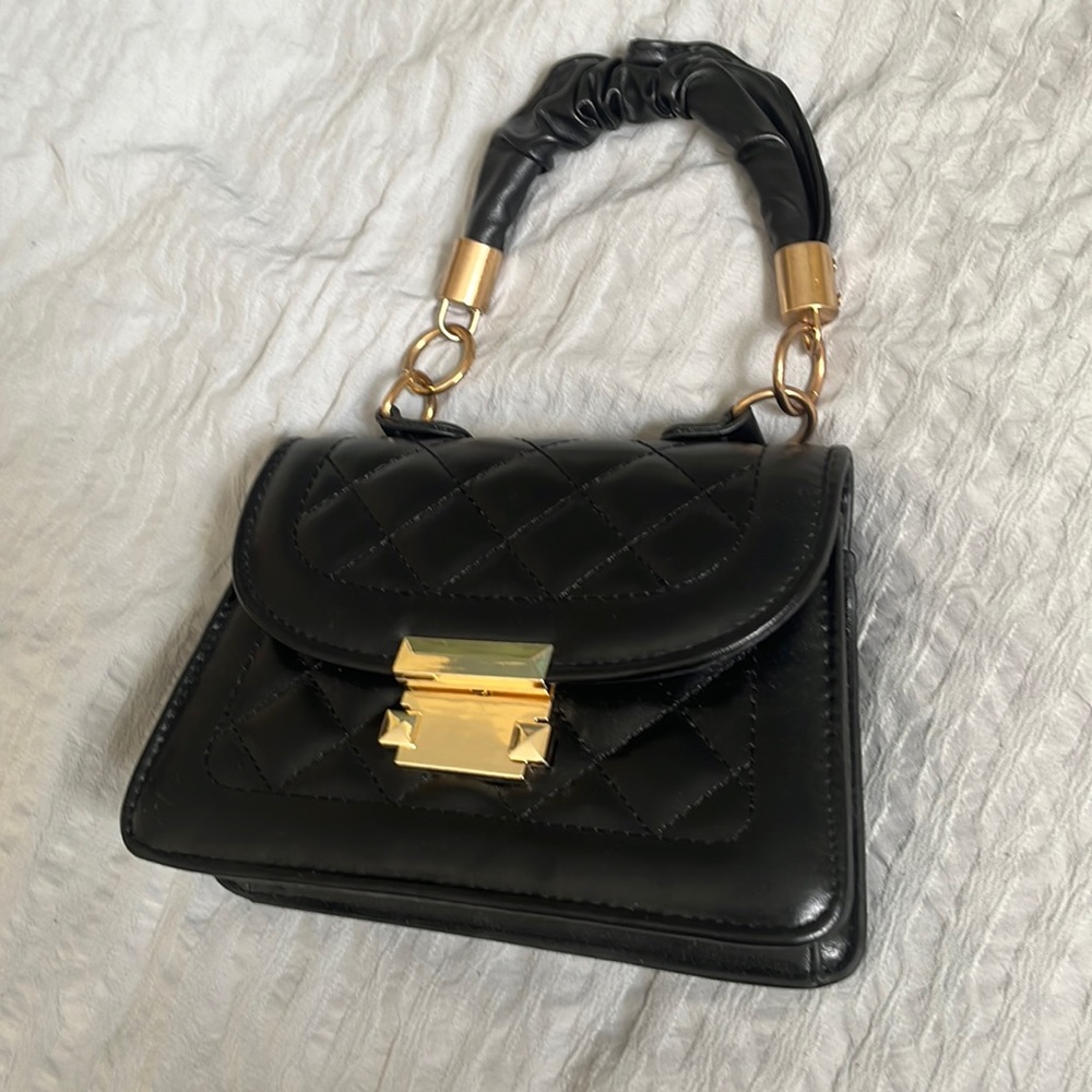 COPY - Black quilted hand bag with gold metal design